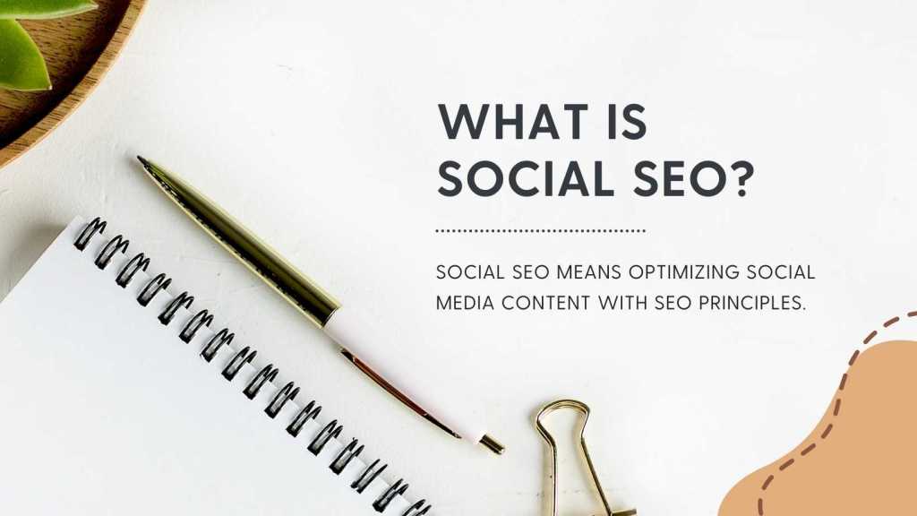 Am image of a notebook and a pen with a text: What is social SEO? Social SEO means optimizing social media content with SEO principles.